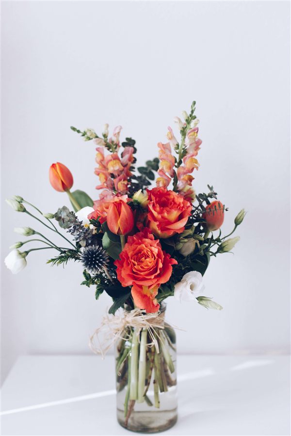 Soft floral arrangement used for event decor inspiration